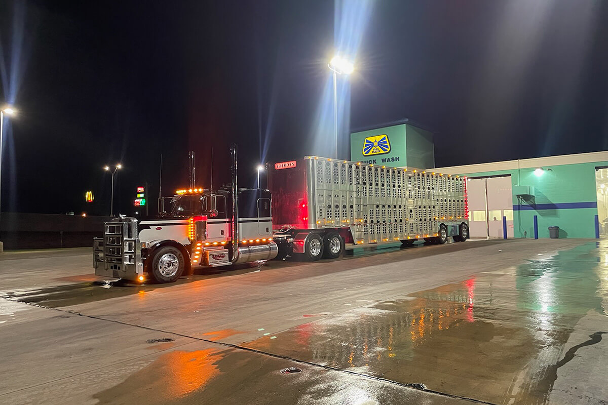 Truck Parked Outside a Wash at Night